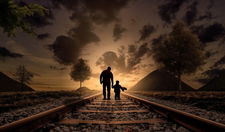 father and son, walking, railway