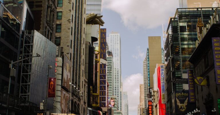 View of Traffic on the Street between Skyscrapers in New York City