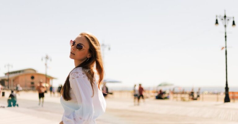 Selective Focus Photography of Woman Wearing White Long-sleeved Top