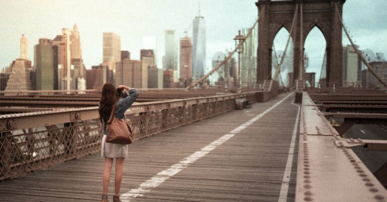 Photo Of Woman On Standing On Wooden bridge