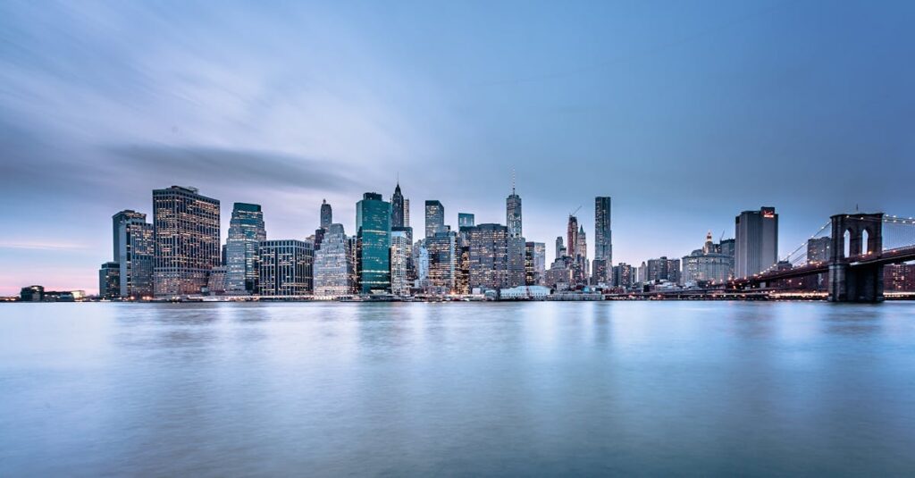 Body of Water Near City Buildings