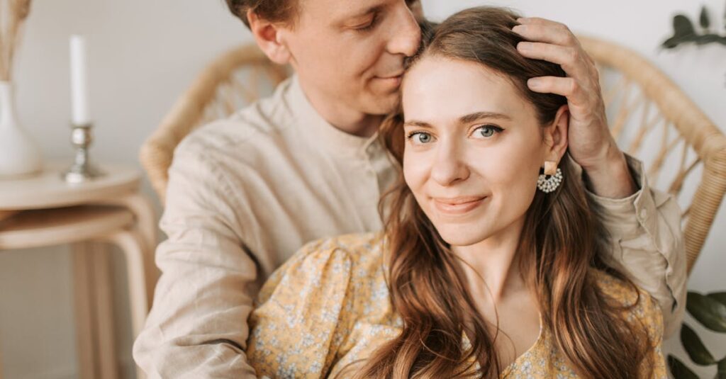 A Man Kissing the Woman's Head