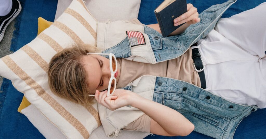 Woman in White Shirt Lying on Bed