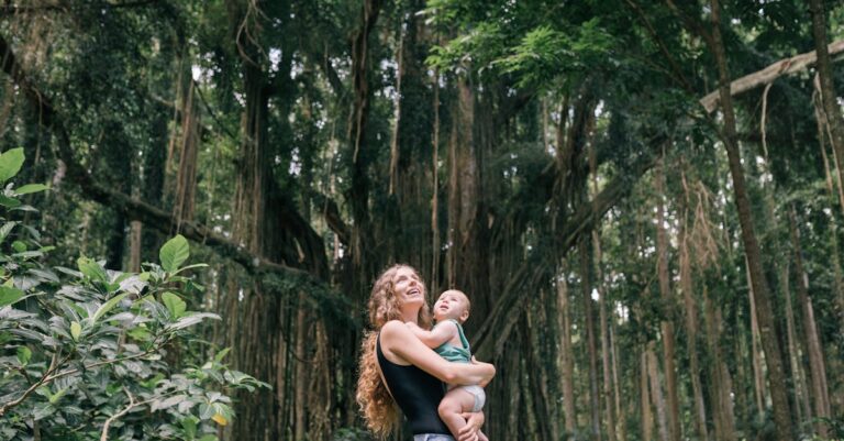 A Woman Carrying Her Child