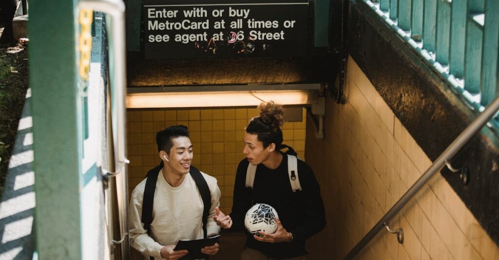 Two Young Men At A Subway Station