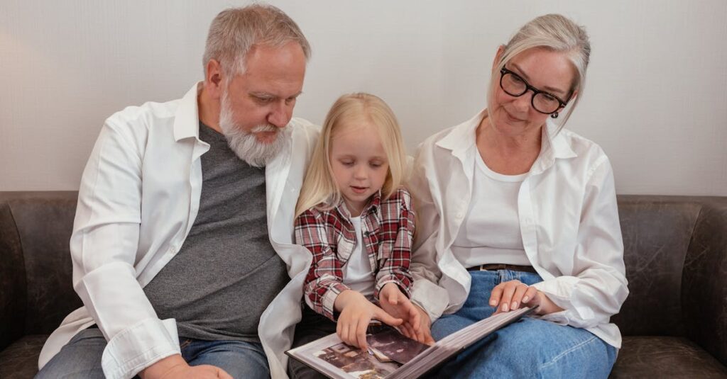 Grandparents Sitting on Leather Sofa with their Grandchild