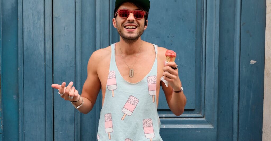 Person in Teal Ice Cream Print Tank Top Holds Ice Cream