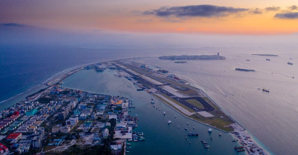 An Aerial Photography of City Buildings Near the Body of Water