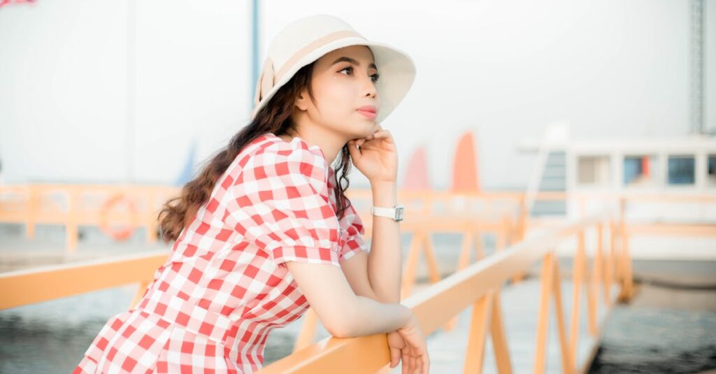 Selective Focus Photography of Woman Wearing Red-and-white Puff-sleeved Dress at Docks