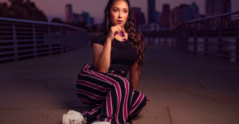 Photo Of Woman Sitting On Ground