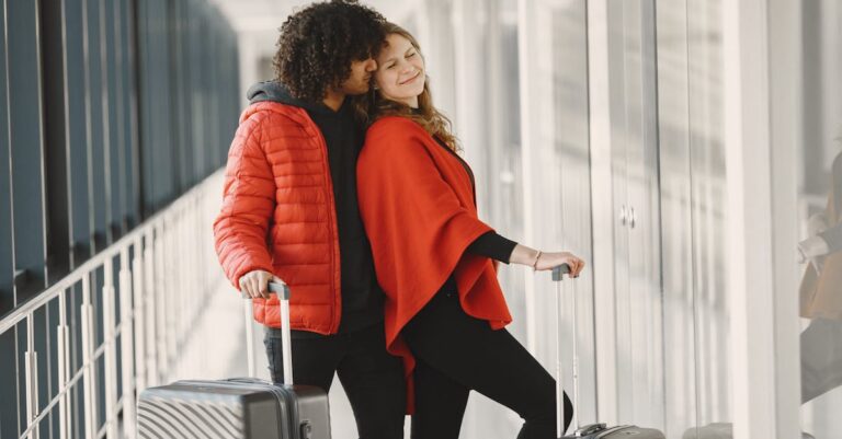 Close-Up Shot of a Couple Holding Luggages