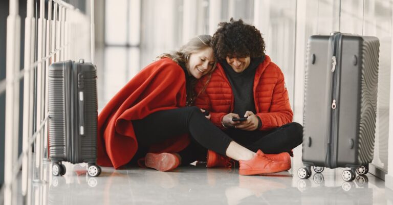 Close-Up Shot of a Couple Sitting on the Floor