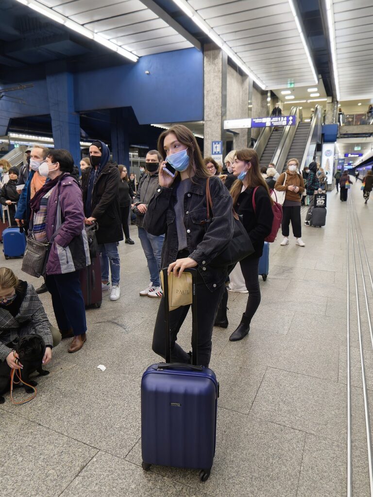 people, train station, waiting-6836150.jpg