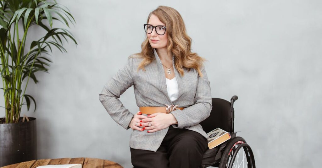 Woman in Gray Blazer Sitting on Wheelchair