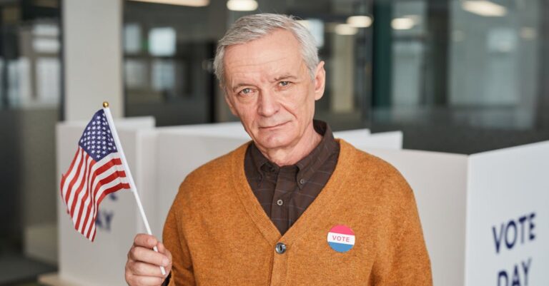 Elderly Man Holding a Flag