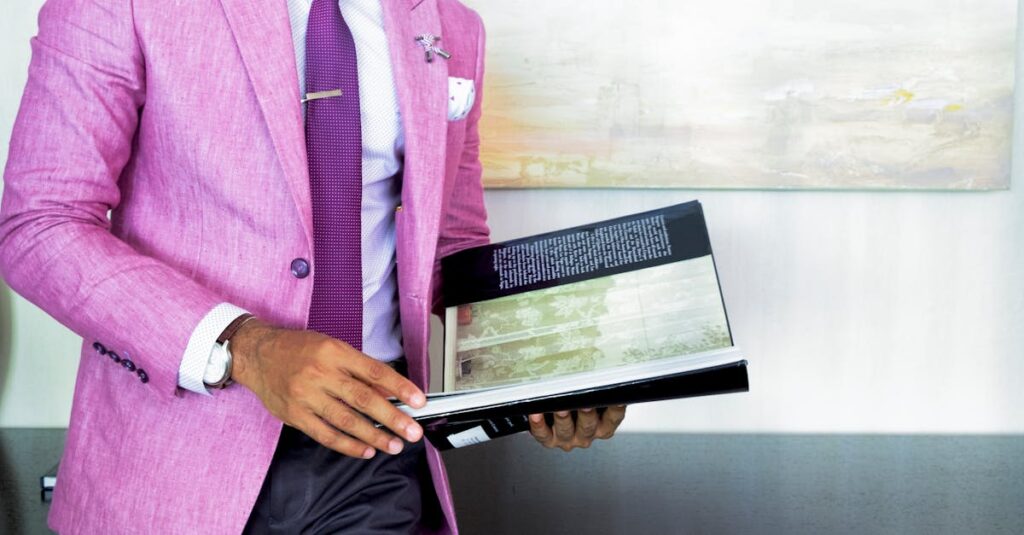 A businessman in a pink suit holding a book, symbolizing success and professionalism.