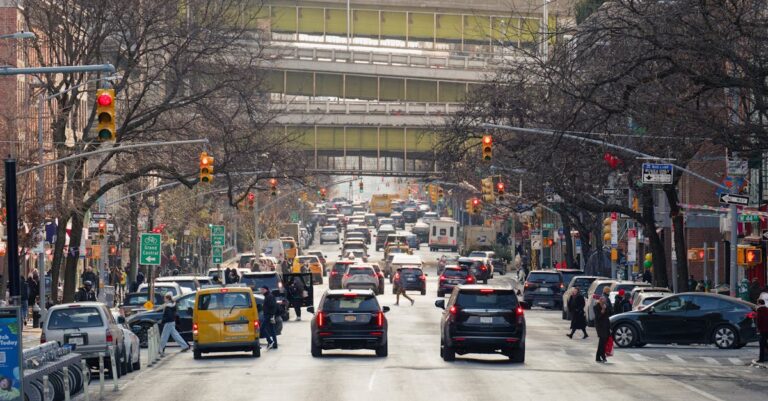 Free stock photo of busy city street, city transportation, crowded intersection