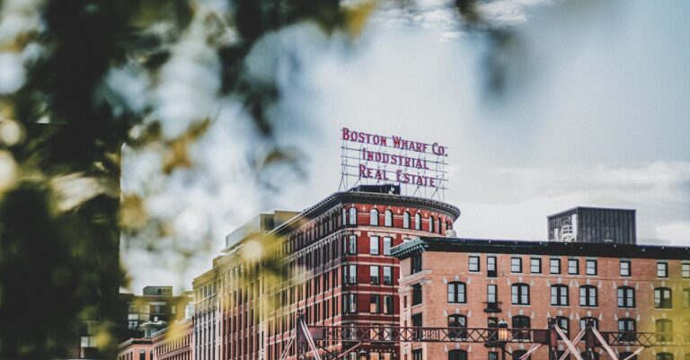 Iconic Boston Wharf Co building showcasing industrial architecture under a clear sky.