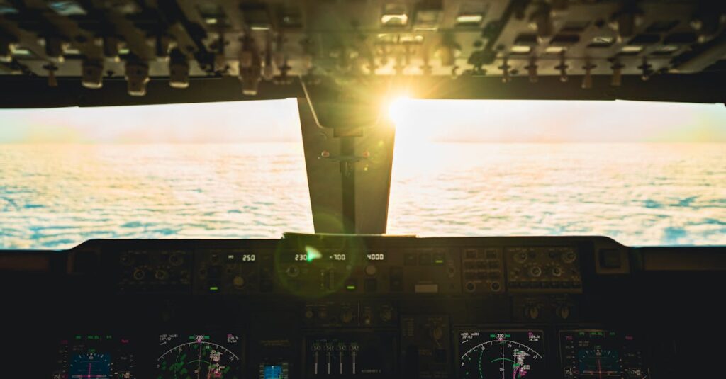 Captivating view from airplane cockpit at sunset over ocean, revealing flight controls.