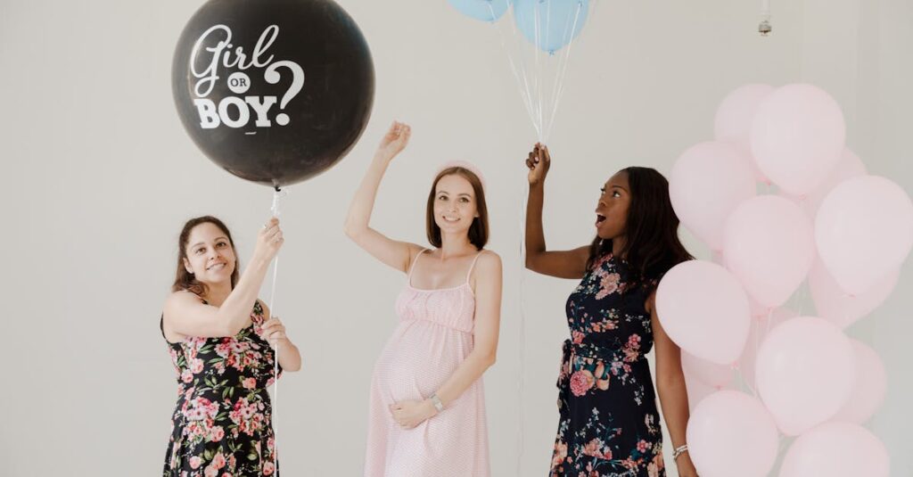 Three women celebrate at a gender reveal party with balloons, creating a fun and happy atmosphere.