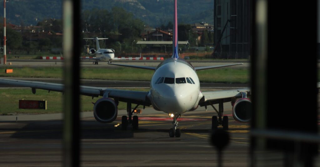 Front view of airplane on runway in Lombardia, Italy, ready for departure.