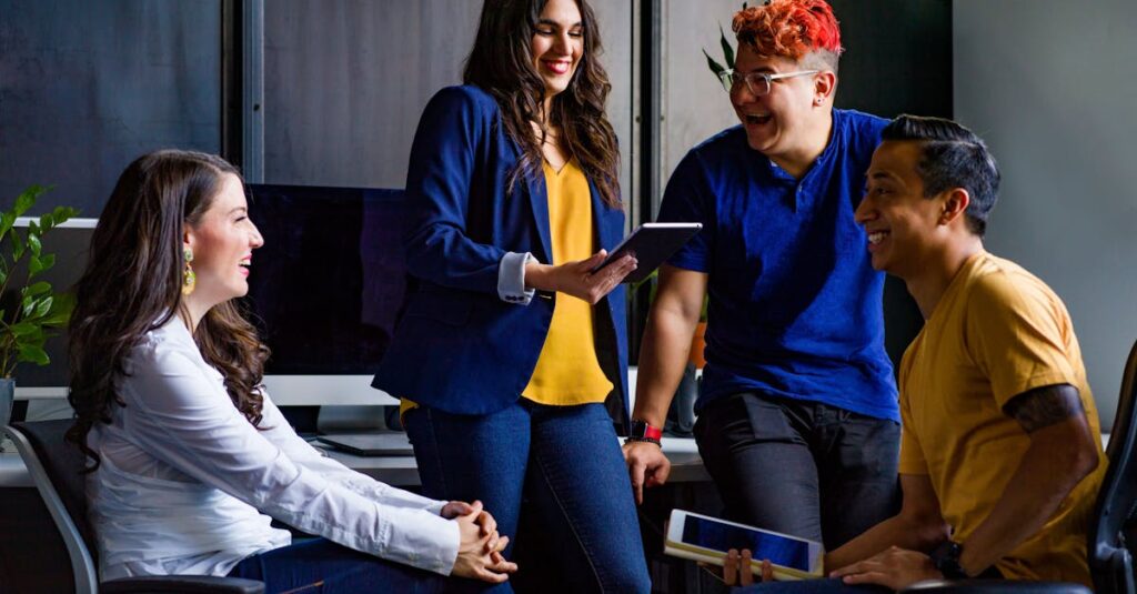 A diverse group of coworkers engaging in a lively discussion in a stylish office environment.